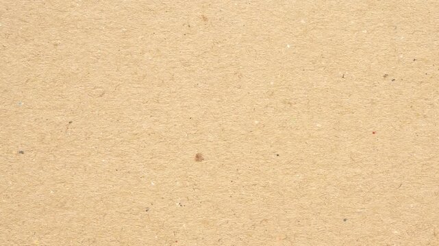 Old brown recycle cardboard kraft paper texture background stop motion