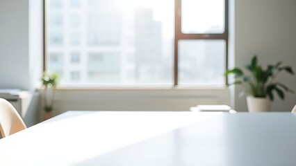 Fototapeta premium Minimalist office desk bathed in morning sunlight, emphasizing a clean and productive workspace.