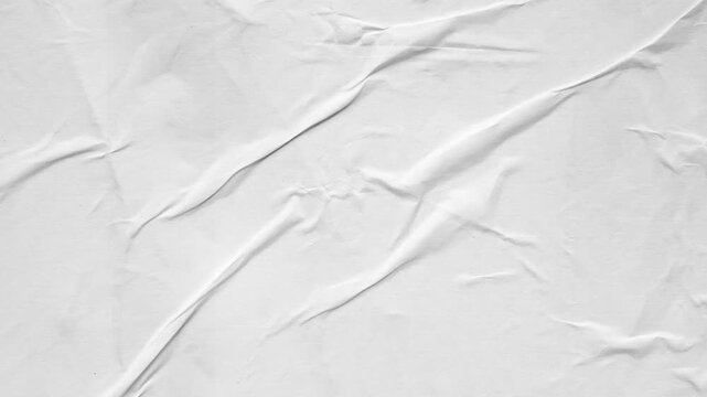 white crumpled and creased glued wrinkled paper poster texture background stop motion