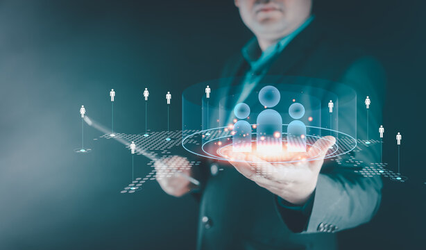 Businessman using CRM to analyze customer behavior allows businesses to refine marketing strategies and boost sales effectively. Customer relationship management concept.