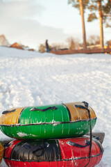 Tubing in a city park on a sunny winter day