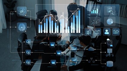 A dynamic business meeting featuring a diverse team collaborating over digital tools for data visualization and strategy planning in a modern office environment. Raster