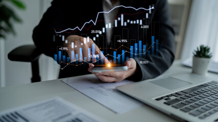 A businessperson focuses on analyzing financial data on a smartphone, showcasing various graphs and charts that represent market trends in a modern office setting. Scalp