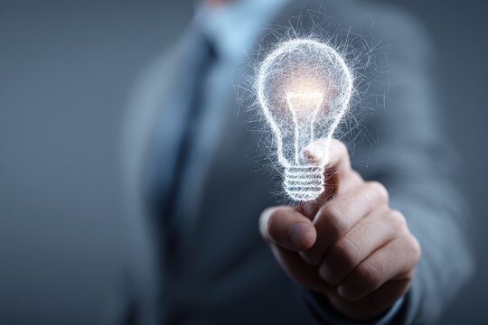 Consultant presents innovation idea with glowing light bulb concept in a modern business setting