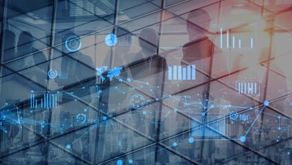 Silhouettes of business people in a modern office show the connection between teamwork and digital data visualization against a cityscape backdrop, symbolizing corporate innovation. Xenic