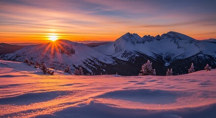 A breathtaking winter sunrise paints the snow-capped mountain peaks with vibrant hues of orange and pink, showcasing a stunning landscape of frosted pines and a serene mountain vista.
