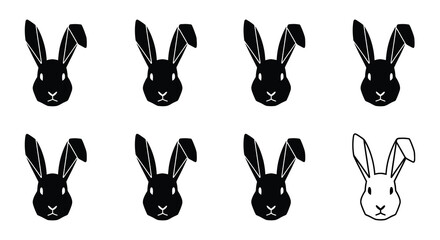 A collection of rabbit head silhouettes with one white bunny illustration © Begum
