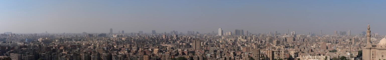 Obraz premium Cairo,Egypt - December 3, 2025: Panoramic view of East Cairo from Citadel, a medieval Islamic-era fortification in Cairo