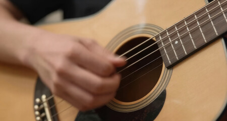 Fototapeta premium Close-up of a guitar string vibrating, motion blur, music concept