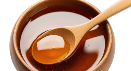 Bowl of honey with wooden spoon transparent background cutout png