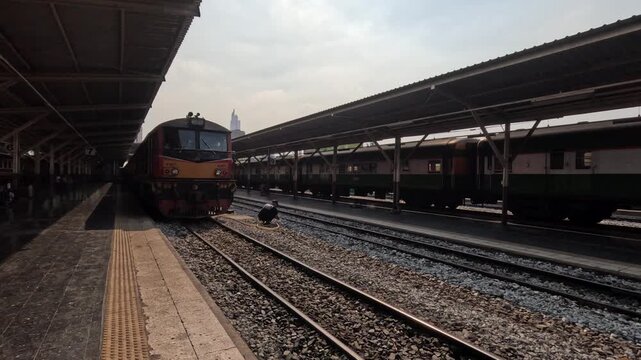 Diesel Locomotive Approaching Platform at Bangkok Train Station