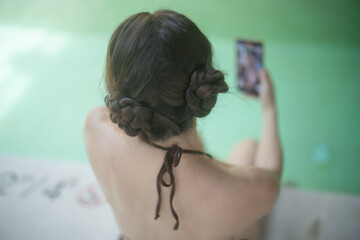 Woman enjoy relax sunbathing on pool bed by swimming pool.