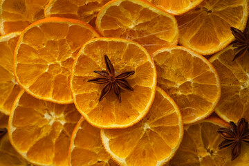 Close-up of dried orange slices with star anise in the center