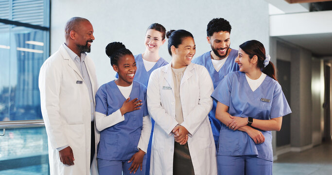 Happy, teamwork and doctors with nurses in hospital for medical support, service or collaboration. Smile, professional and group of healthcare employees with laughing together in clinic with pride. - Powered by Adobe