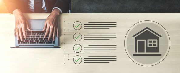 A focused scene of hands typing on a laptop with checklist symbols and a home icon. This image illustrates themes of homeownership, real estate management, and digital transactions. Gantry