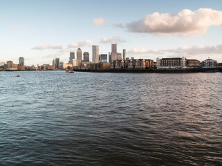 Fototapeta premium London canary wharf business district cityscape over river thames