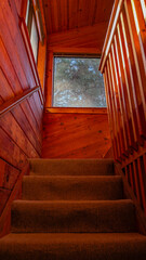 Warm Cedar Staircase in a Rustic Cabin