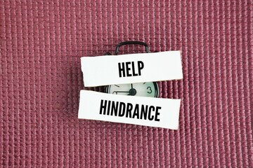 Clock and paper with the words Help and Hindrance. help is anything that aids progress aid, support, while a hindrance is something that slows, stops, or complicates a task obstacle, impediment, barri