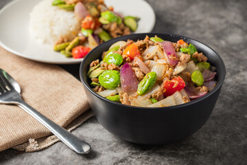 Stir-Fried Minced Pork with Sataw Served in a Black Bowl