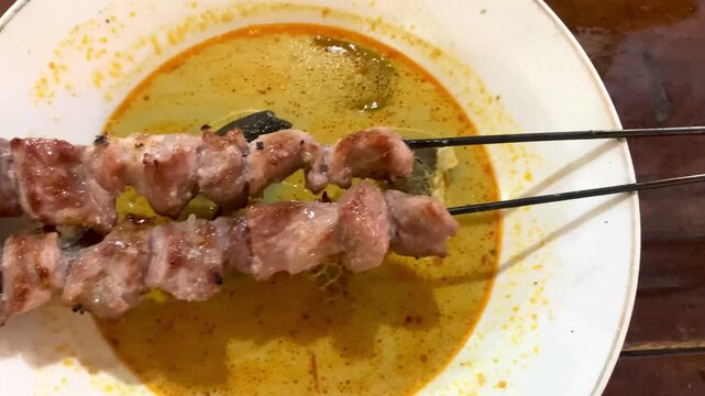 close up of sate klatak, a traditional lamb skewer from Yogyakarta, Indonesia