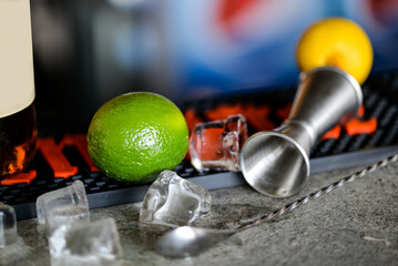 lime and barware on the bar counter