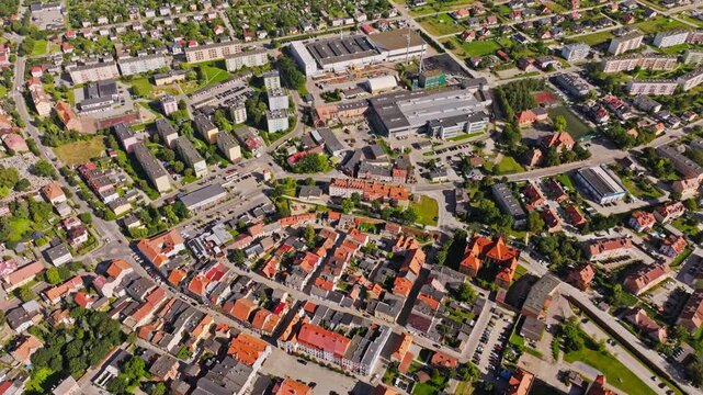 Top down shot of Gniew Poland urban pattern with red roofs and green parks