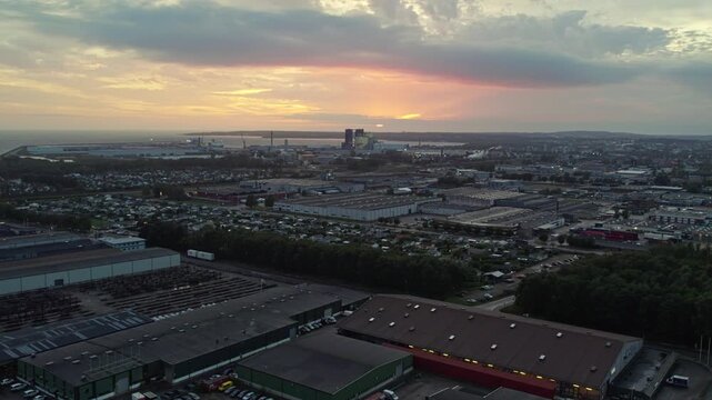 Sunset over Halmstad's industrial area, serene and expansive view