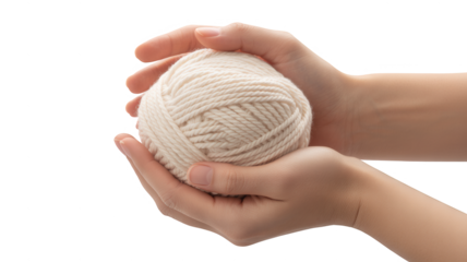 Hands holding a ball of beige yarn, isolated on transparent background