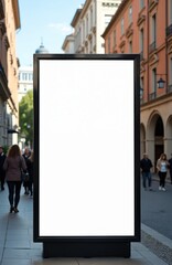 Tall blank billboard on city street sidewalk. People walk past buildings on sunny day. Mock up for ad space and promotion. Clear area for message.