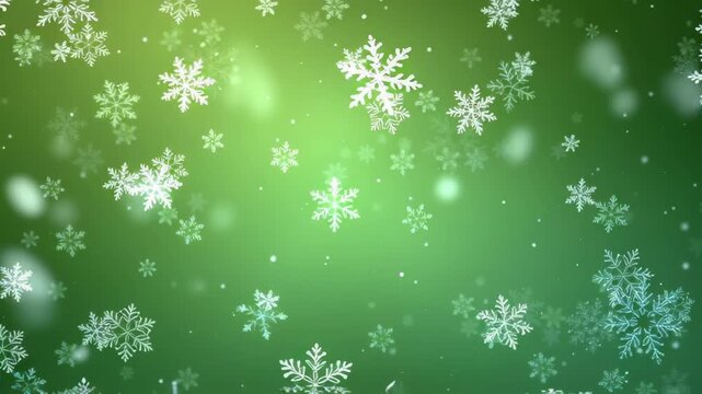 Beautiful snowflakes and snow gently fall against a vibrant green background, creating a magical winter scene perfect for festive Christmas and holiday season video projects.