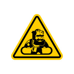 Yellow warning triangle sign featuring a vector silhouette of a homeless man. Flat design caution concept for social issues and urban alert.