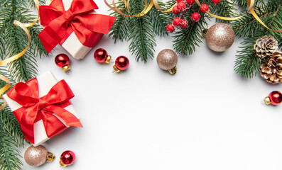 Christmas presents with fir branches and holiday decorations