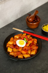 Spicy Korean Tteokbokki with Egg and Pickled Radish