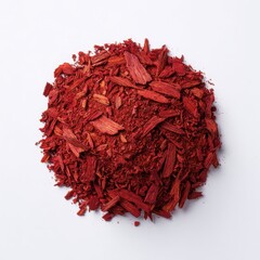 Finely ground red spice pile isolated on a white background.