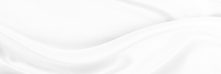 White gray satin texture that is white silver fabric silk panorama background with beautiful soft blur pattern natural.
