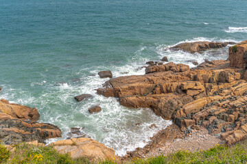 Rocks on the shore at the promenade walk in Qingdao, China