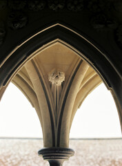 Naklejka premium Arch architectural detail at mont Saint Michel abbey's cloister