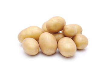 Heap of raw baby potatoes on white background