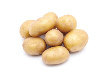 Heap of raw baby potatoes on white background