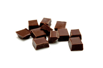 Pieces of tasty chocolate isolated on white