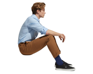 Full length portrait of one handsome young businessman sitting on the floor smiling in a casual pose