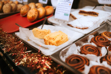 A vibrant assortment of pastries on the street market. Handmade street food. High quality photo