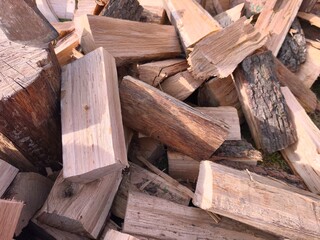 Chopped Firewood and Axe in Sunlight