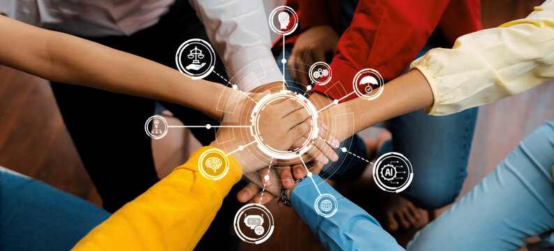 Startup company employee team stacking hand together symbolize successful group of business partnership and strong collective unity teamwork in community workplace in panoramic banner. Synergic Amity