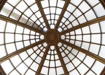 the architectural design of the large glass domed ceiling or skylight that forms part of the ceiling within the main hall or lobby of the National Gallery. is a prominent element of its interior desig