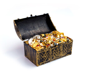 Legendary fancy tale treasure chest. Ancient coffer opened revealing pile of gold bars have magic lamp golden artifact and sparkling colorful cut diamonds isolated on white background.