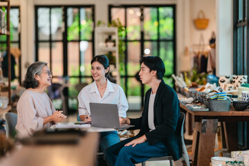 Asian Male Investor Signing Partnership Agreement at Family Ceramic Store