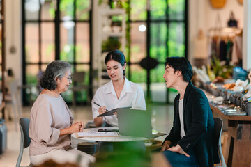 Asian Male Investor Signing Partnership Agreement at Family Ceramic Store