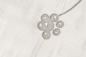 Cloud Dancer design with a cluster of stylized berries on a textured background