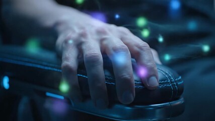 Close up of a human hand resting on a futuristic glowing chair armrest with digital light effects - Powered by Adobe